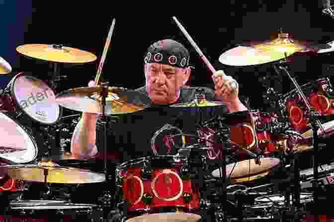 A Drummer Performing A Dynamic Drum Solo On Stage How To Play Rock N Roll Drums