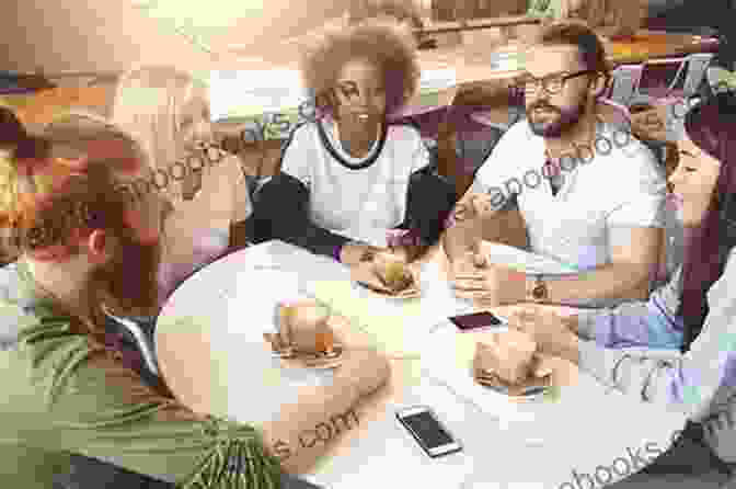 A Group Of Young Africans Sitting Around A Table, Laughing And Talking. Debating The Afropolitan Pietro Bartolo