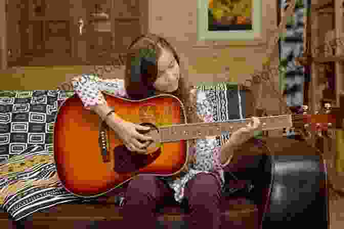 A Young Girl Playing The Guitar, Surrounded By Friends. Gender Age And Musical Creativity